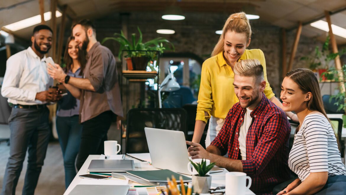 Illustration of a web design team working on a website